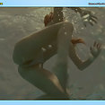 Erica Durance topless & wet - image 