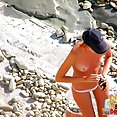 Amateurs sunbathing naked on beach - image 