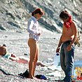 Amateurs sunbathing naked on beach - image 