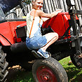 Pinky June on tractor - image 