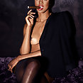 Playboy Playmate Eugena Washington smoking cigar - image 